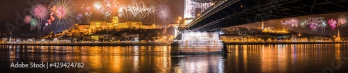 Fireworks display at the Royal palace of Buda and the Chain Bridge in Budapest, New Year Eve panorama 