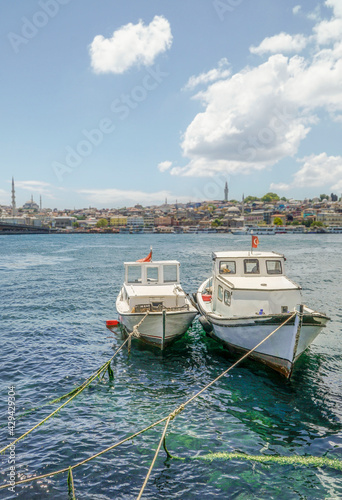 small wooden fishing boats on sea in Istanbul, Turkey