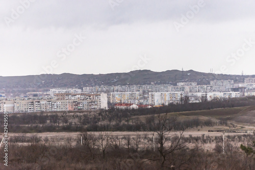 Kerch from the cape. Panorama of winter Kerch in the early evening. A dreary Soviet city.