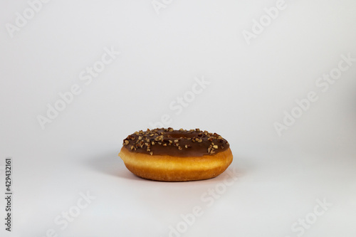 Chocolate Glazed Donut with Peanuts topping
