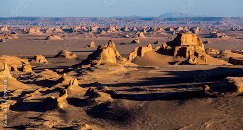 The Lut Desert in Iran is the world's 27th-largest desert and was inscribed on UNESCO's World Heritage List. It is hottest place in the world. photo