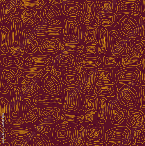 On a red background, a yellow linear drawing of a labyrinth. Excellent print on fabric and packaging. Vector graphics