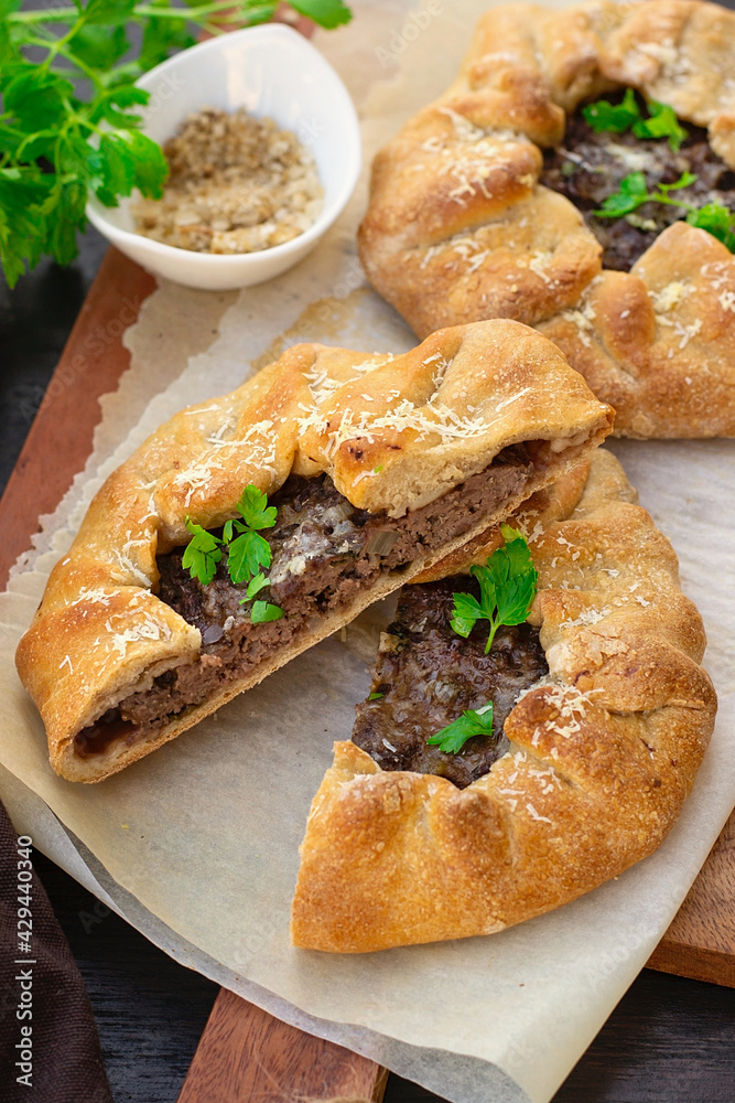 Meat pie with ground beef, onions and cheese