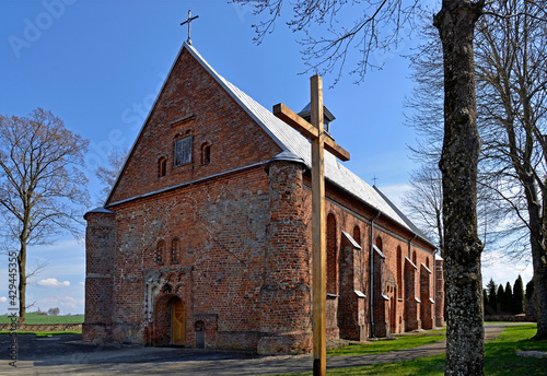 built in the second half of the 16th century in the Gothic style, the Catholic Church of st. Matthias in the village of Pawłowo in Masovia, Poland. The photos show a general view of the temple with th