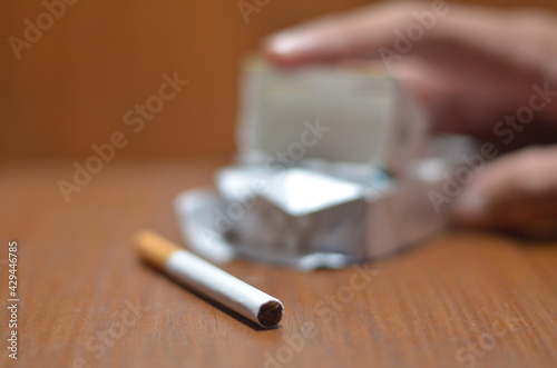 An up close view of a package of several cigarettes