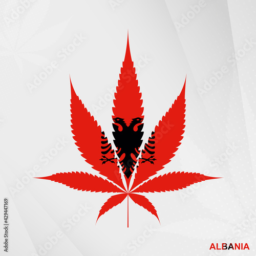 Flag of Albania in Marijuana leaf shape. The concept of legalization Cannabis in Albania.