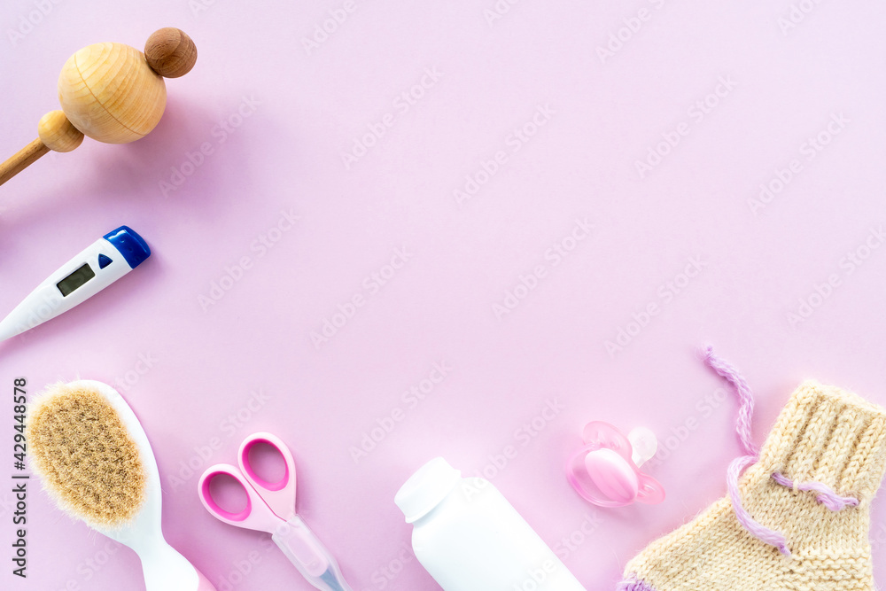 Baby care kit on pink background, top view, copyspace. Concept of children's hygiene. Flat composition with children's accessories, background. Baby care kit on pink background, top view, copyspace. Concept of children's hygiene. Flat composition with children's accessories, background.