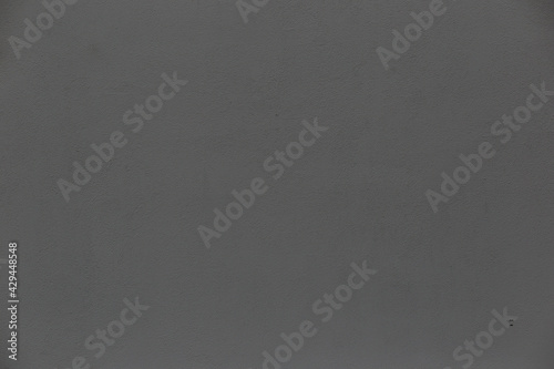 horizontal textural background of a gray cement wall