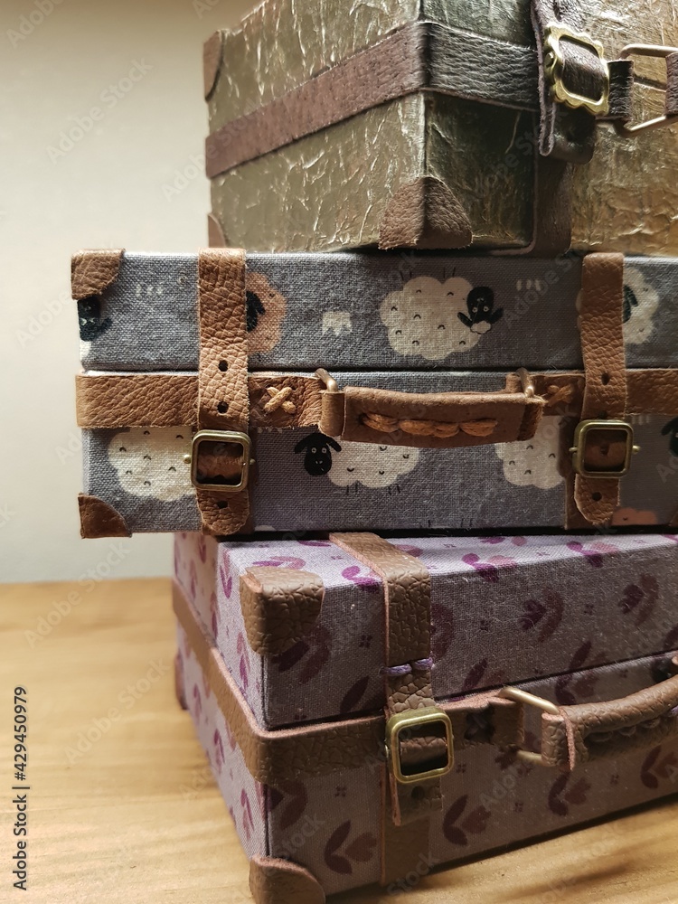Craftsman makes miniature doll suitcases