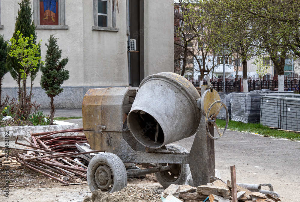 A concrete mixer on a construction site A concrete mixer on a construction site