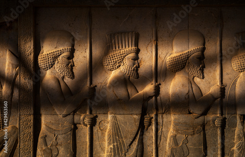 Relief sculpture of the subject people of the Achaemenian Empire in Apadana Palace, Persepolis, Iran. photo