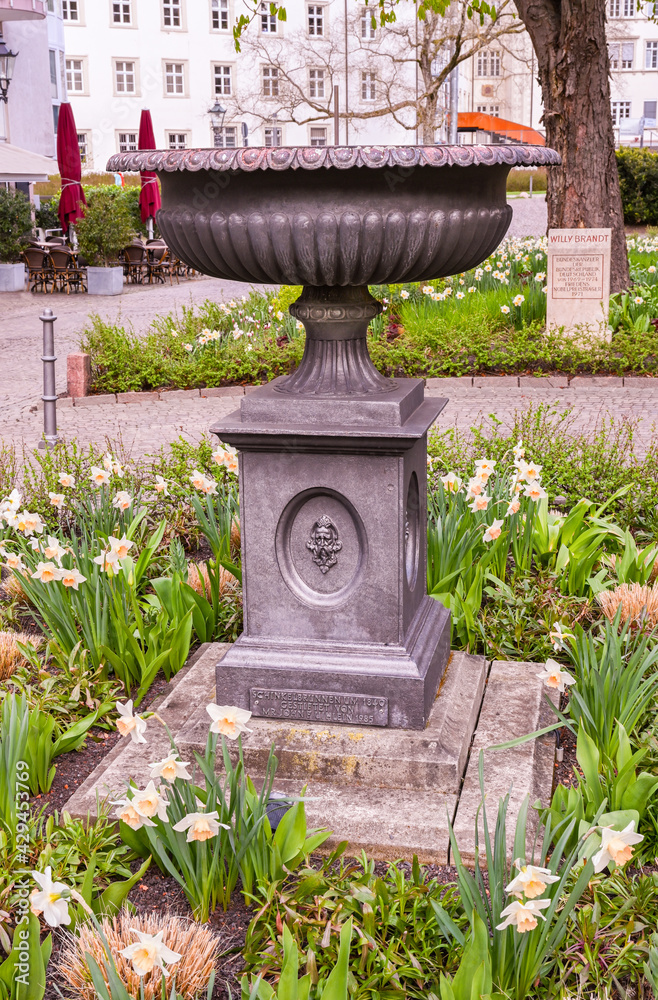 A neoclassical fountain designed by the famous Prussian builder Karl Friedrich Schinkel on Willy Brandt square in the city of Baden Baden. Baden Wuerttemberg, Germany, Europe A neoclassical fountain designed by the famous Prussian builder Karl Friedrich Schinkel on Willy Brandt square in the city of Baden Baden. Baden Wuerttemberg, Germany, Europe