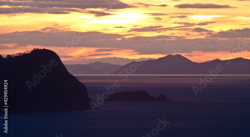 Cape Billano and Billano island at sunset. Basque country  Spain  Europe.