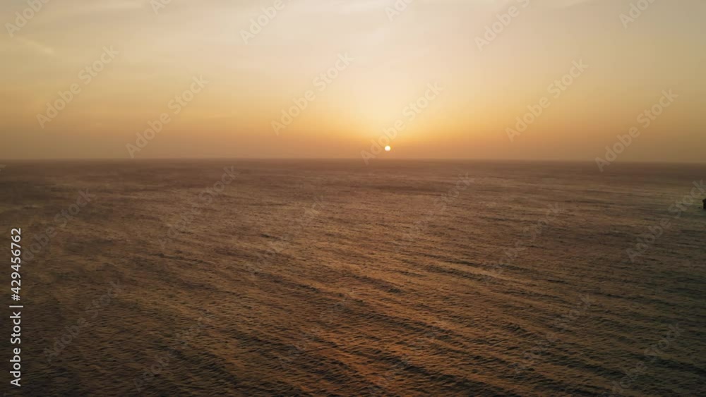 aerial image with drone at sunset on Karakter beach on the island of Curaçao in the Caribbean