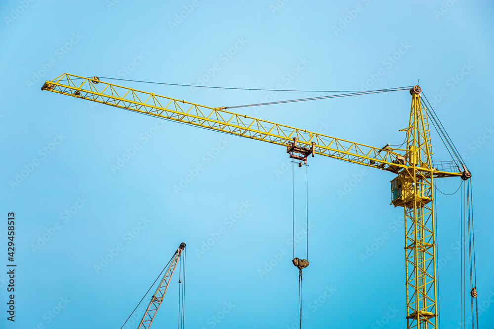 construction crane on blue sky background construction crane on blue sky background