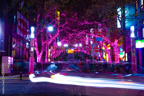 A night illuminated street in Shibuya middle shot © tokyovisionaryroom