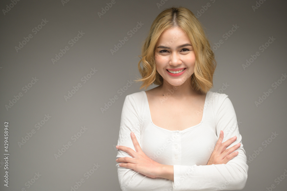 portrait of young blonde woman over white background studio portrait of young blonde woman over white background studio