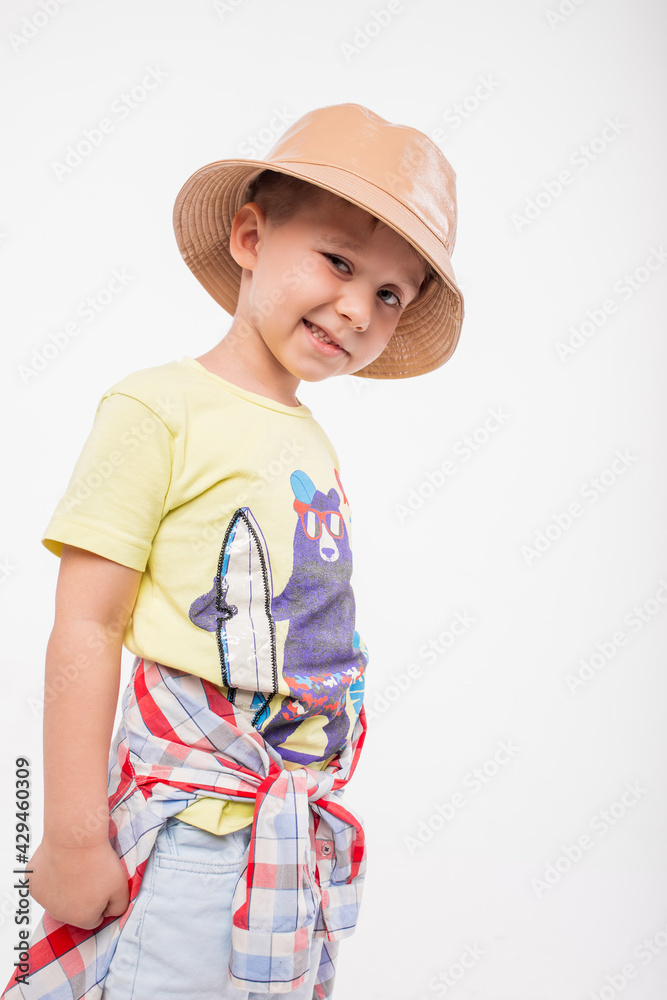 Funny cute little adorable caucasian boy posing in studio on white background Funny cute little adorable caucasian boy posing in studio on white background
