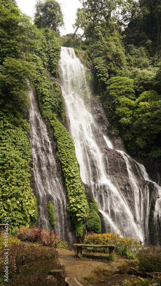Banyumala Waterfall in a jungle sourrounding on Bali Island, Indonesia.