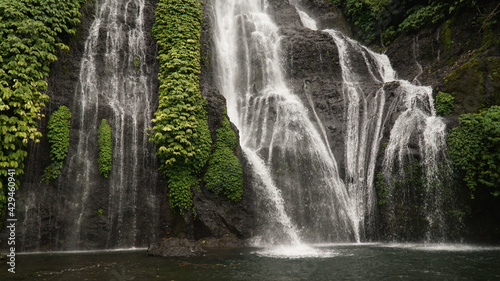 Banyumala Waterfall in a jungle sourrounding on Bali Island, Indonesia. photo