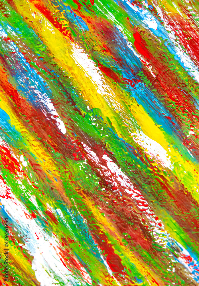 Background from different strokes of red, yellow, green, white and blue paint