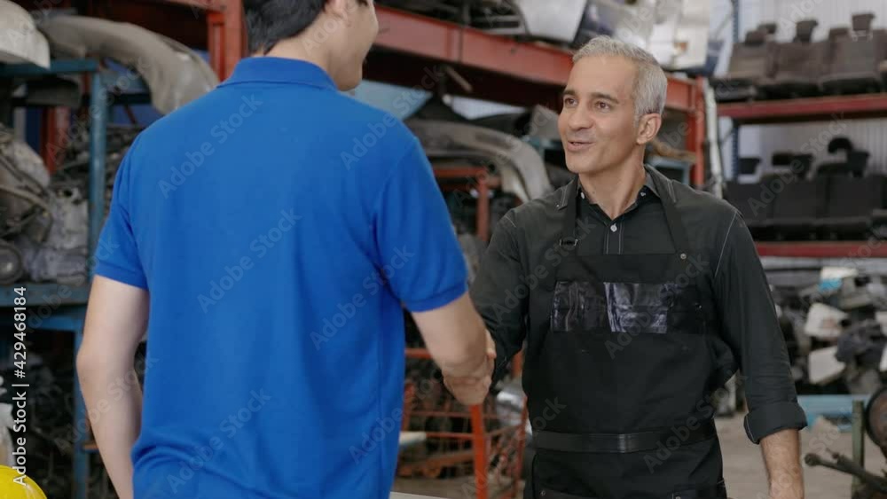 Business man is greeting client in business shop , business and engineering contract concept . Business man is greeting client in business shop , business and engineering contract concept .