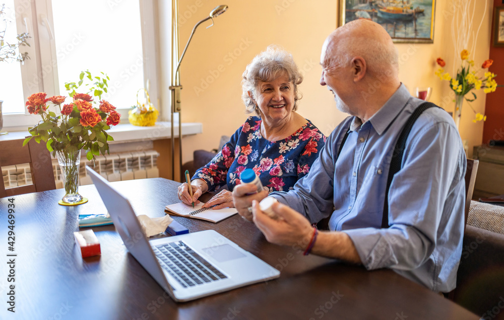 Senior couple reviewing drug prescription online
Senior couple reviewing drug prescription online