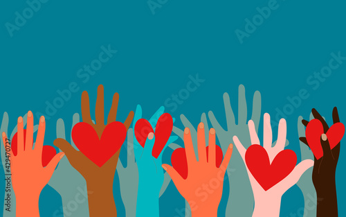 Volunteers, social workers, ordinary people hold hearts in their palms. Unity, cohesion of a multinational society. Charity, voting, donations, social assistance. Blue deep background.  photo