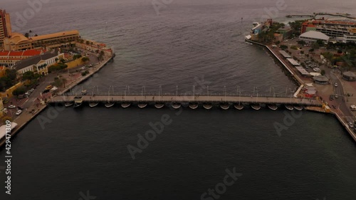 aerial drone image of the bridge in the city of curacao in the caribbean during the day photo