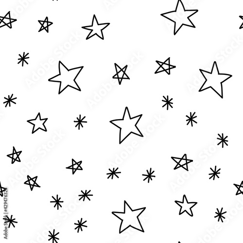 Hand drawn stars seamless pattern. Monochrome texture background of star doodle illustrations.