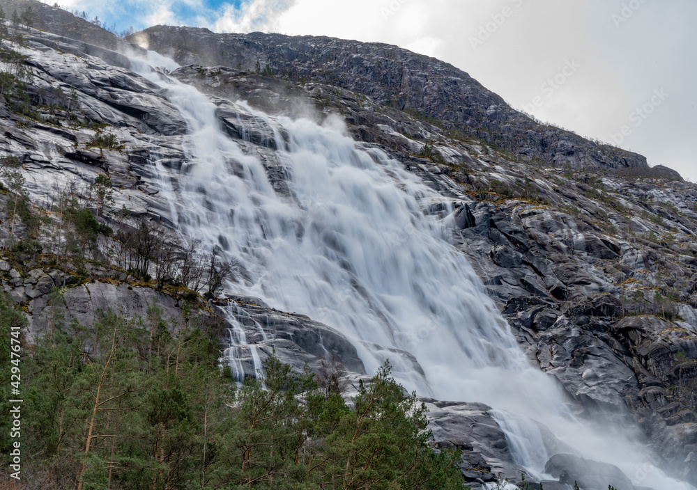 Langfossen, a waterfall located in the municipality of Etne in Vestland County, Norway, Scandinavia