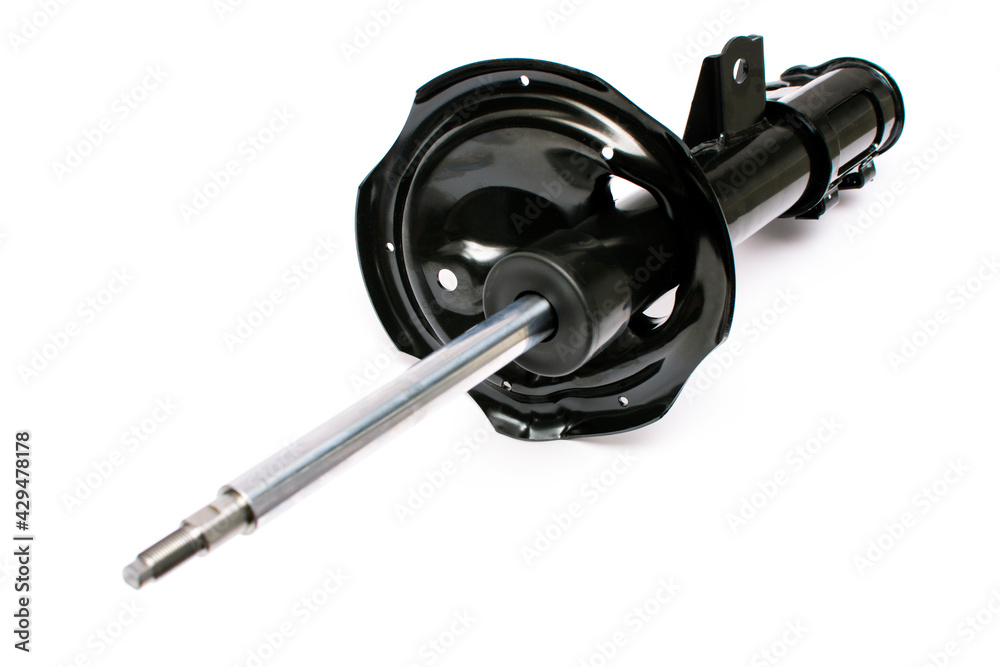 Front strut hydraulic shock absorber with fastening loops and coil spring seat. Vehicle suspension system car. Spare part isolated on white background. Front strut hydraulic shock absorber with fastening loops and coil spring seat. Vehicle suspension system car. Spare part isolated on white background.