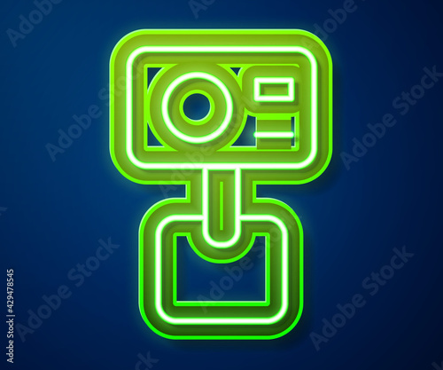 Glowing neon line Action extreme camera icon isolated on blue background. Video camera equipment for filming extreme sports. Vector