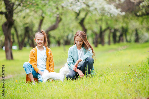 Two little kids on picnic in the park