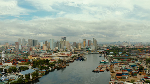 Aerial view of Panorama of Manila city. Skyscrapers and business centers in a big city. Travel vacation concept © Alex Traveler