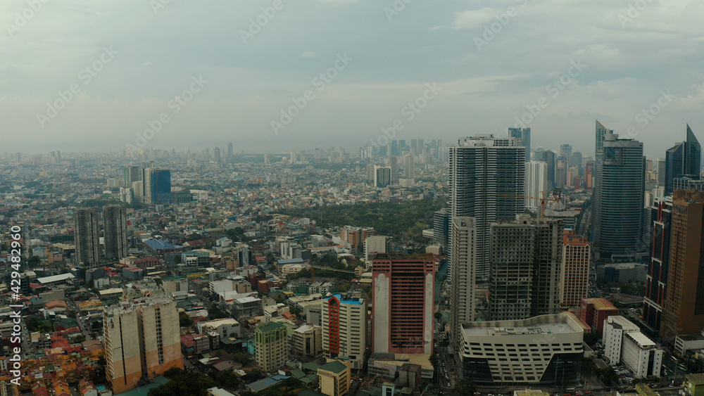 Aerial view of Panorama of Manila with skyscrapers and business centers in a big city. Travel vacation concept