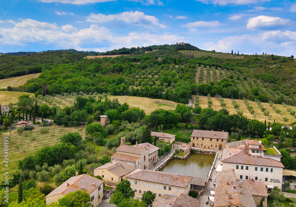 Aerial view of Bagno Vignoni natural pools along the hills, Tuscany