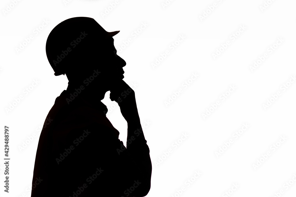 thinking engineer head profile with hand under chin, silhouette of construction worker in hard hat on isolated background