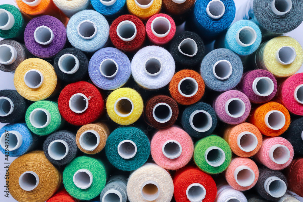 Multicolor thread spools top view Multicolor thread spools top view