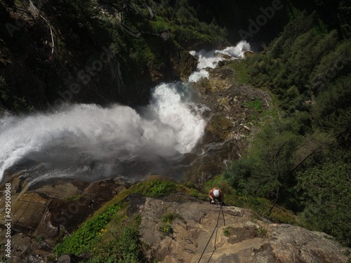 Top down of female climber on Via Ferrata at Stuibenfall waterfall in Umhausen Niederthai Oetz Valley Tyrol Austria alps photo