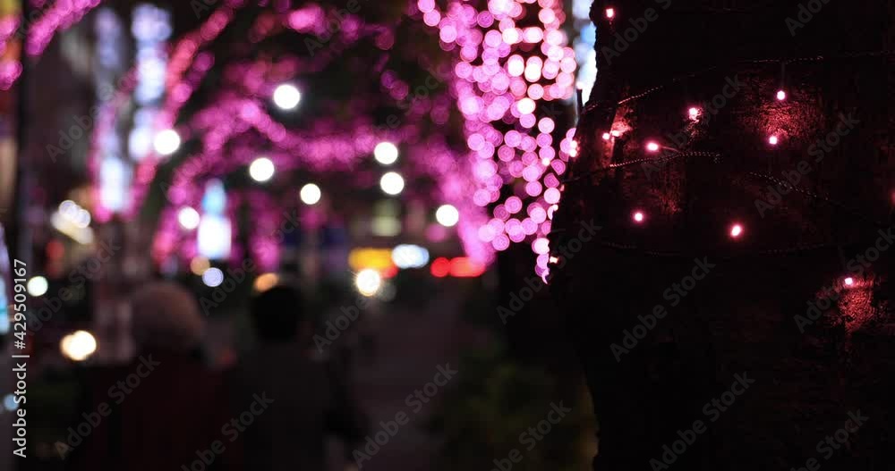 A night illuminated street in Shibuya close shot focusing A night illuminated street in Shibuya close shot focusing