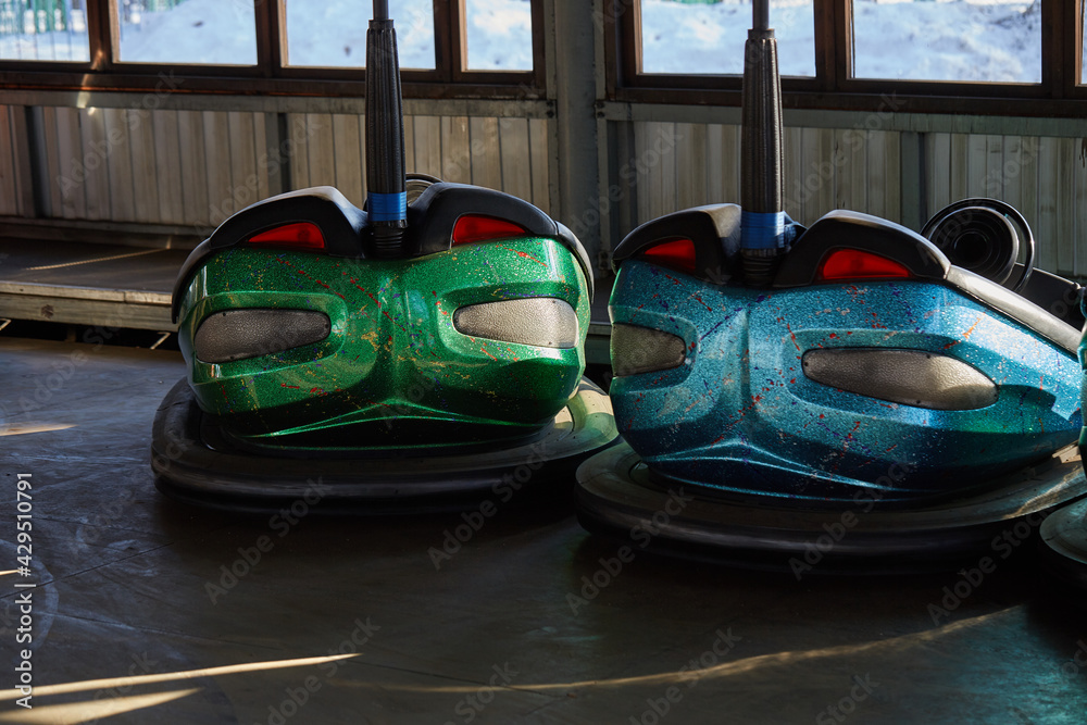 car bumpers on fairground rides in an amusement park. Entertainment in