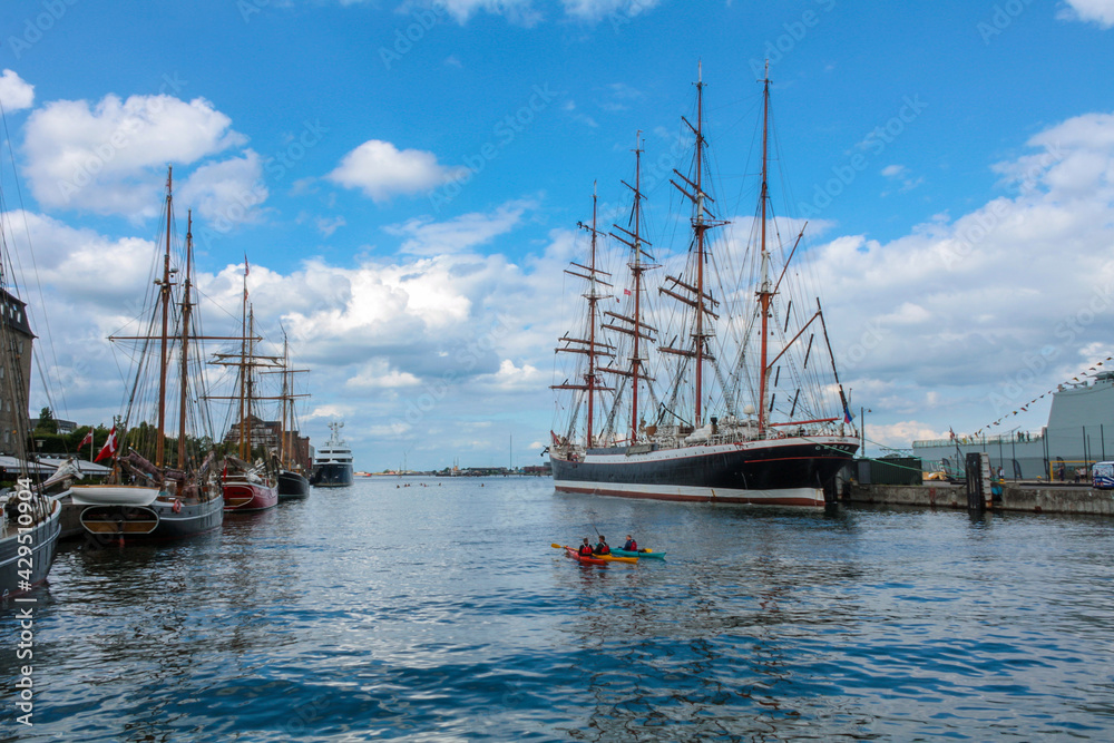A majestic ancient sailing ship moored at the port of Copenhagen, Denmark