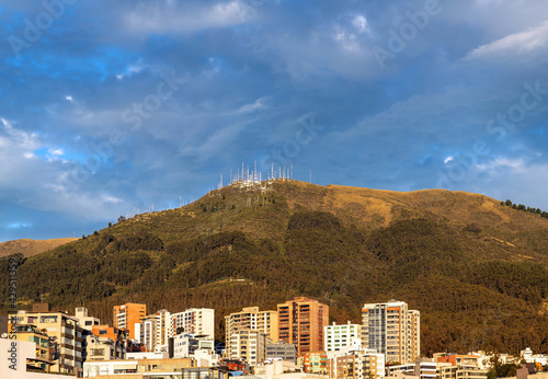 Modern apartment buildings by Pichincha volcano at sunrise, Quito, Pichincha province, Ecuador.