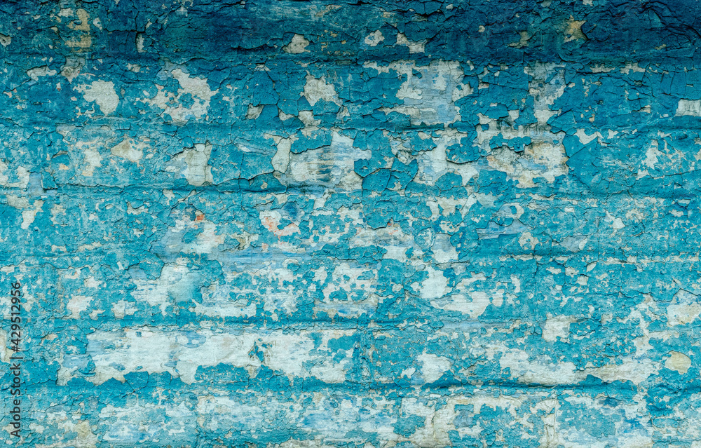 Old cracked brick wall with blue peeling paint Old cracked brick wall with blue peeling paint