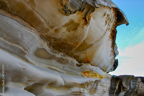 Принти на полотні A eroded sandstone rock formation overhang in the Sydney suburb of Bondi Beach, Australia