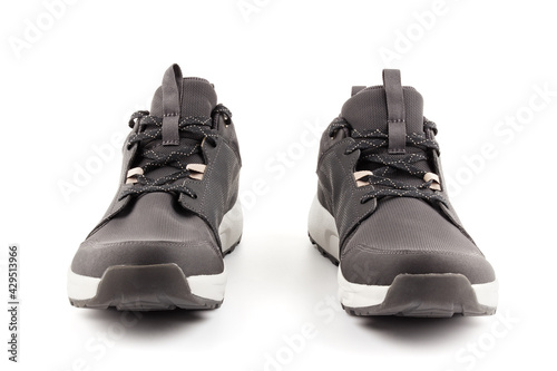 pair of black airmesh summer walking lightweight shoes isolated on white background photo