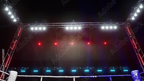 Empty boxing arena waiting new round . fly camera 4k hi quality video render. High quality 4k footage photo