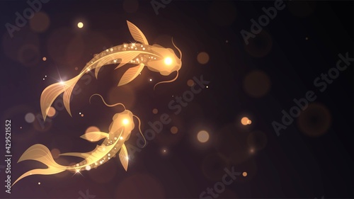 Two glowing golden fish on a dark background, sparkling koi fish