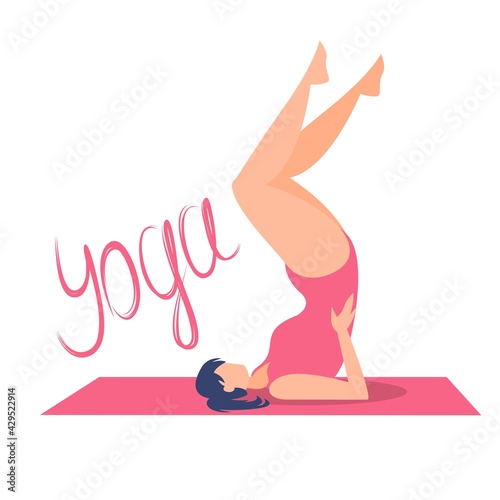 White girl in pink swimsuit doing yoga on the mat